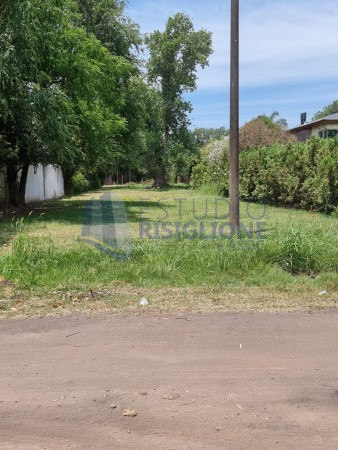 TERRENO FUNES PARADA 17 SOBRE CALLE SANTA FE CON  SALIDA A 2 CALLES 868m2