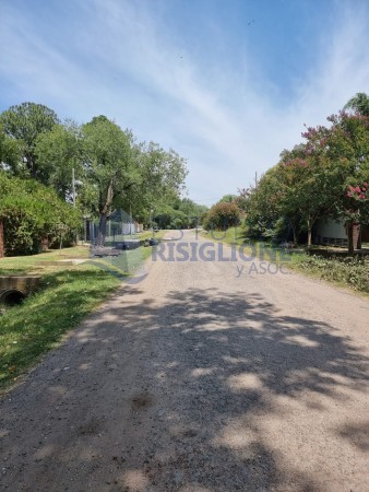 TERRENO FUNES PARADA 17 SOBRE CALLE SANTA FE CON  SALIDA A 2 CALLES 868m2